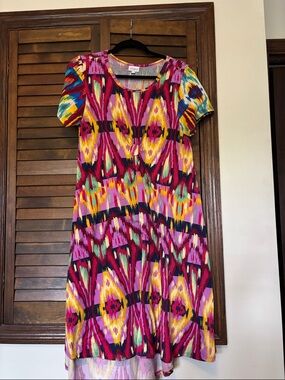 LuLaRoe carly asymmetrical swing dress. Wore one time very vibrant.